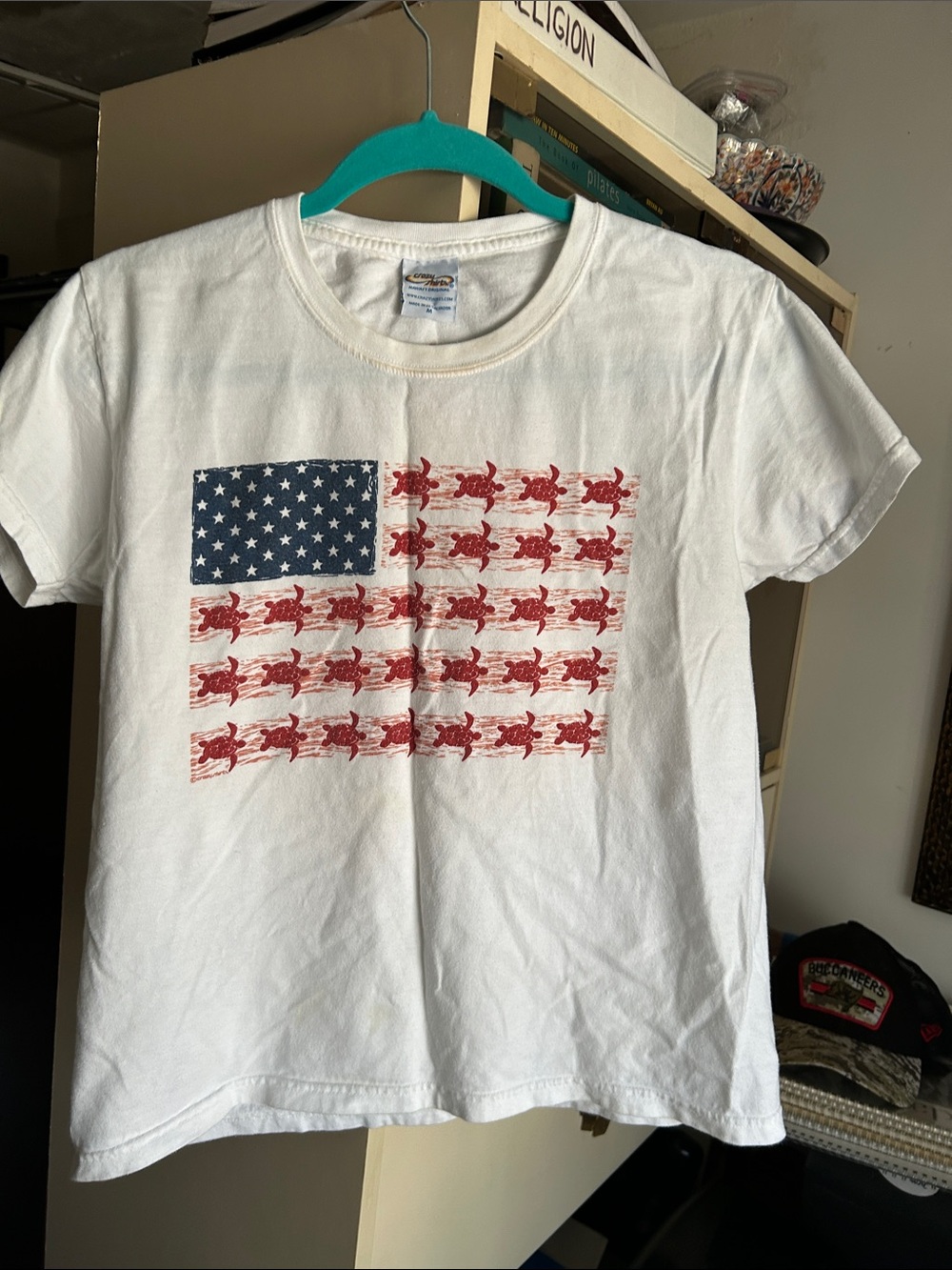 White Tee with American Flag Graphic and Red Turtle Motif